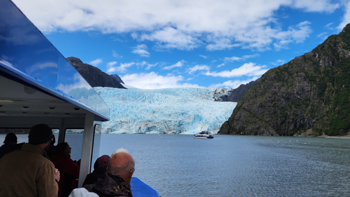 Passengers viewing Holgate Glacier up close during a Kenai Fjords Cruise with Major Marine Tours from Seward, Alaska.
