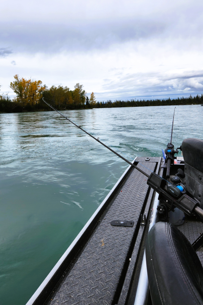 King of the River Kenai River Fishing Trip – Side View with Rods - Dohrn Travels Fishing rods set up on a King of the River boat during a guided fishing trip on Alaska’s Kenai River