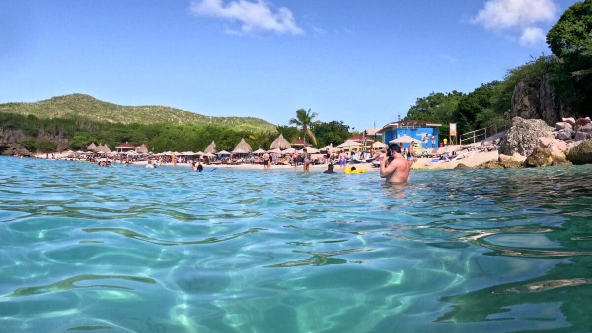 Swimming Conditions at Grote Knip Beach - Dohrn Travels Shallow swimming area at Grote Knip Beach Curaçao with beach in background
